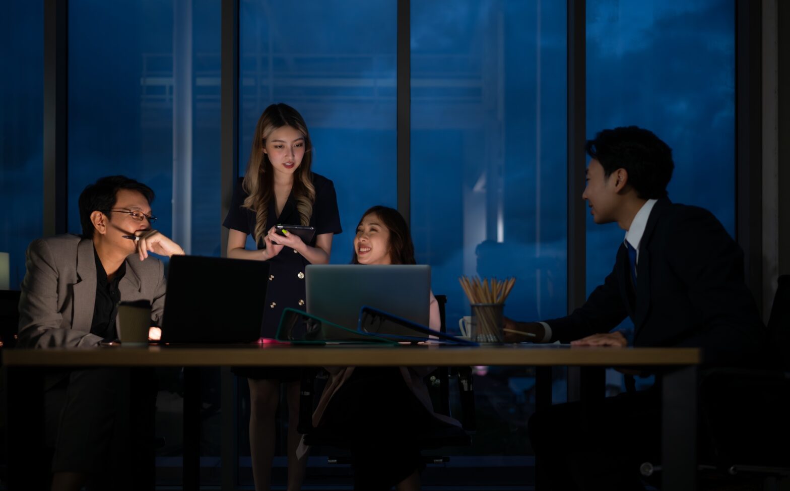 Group,Of,Business,People,Working,In,Office,At,Night.,Business
